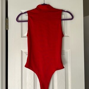 Red mock neck bodysuit